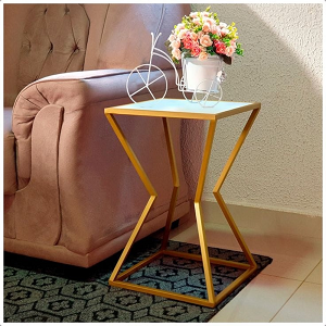 Beautiful luxury gold square side table with white marbel top .