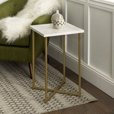 Luxury modern side table square shape with metal gold finish frame and top white marbel .